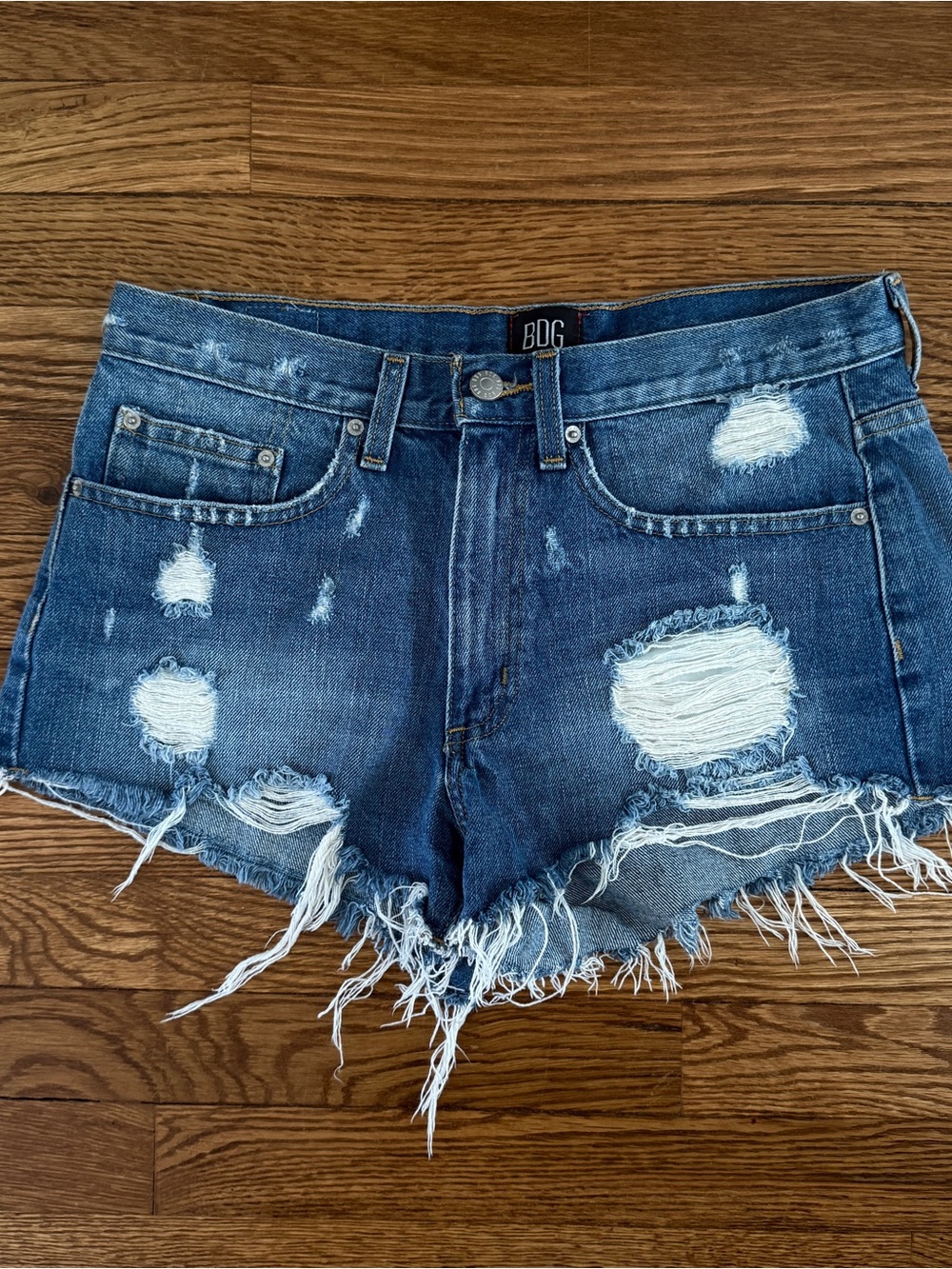 BDG Mid-Rise Distressed Denim Shorts in Dark Blue